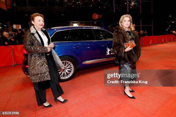 Catherine Frot and Catherine Deneuve arrive at the 'The Midwife' premiere during the 67th Berlinale International Film Festival Berlin at Berlinale...