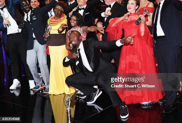 Laureus World Sportsman of the Year Award winner Usain Bolt poses with the other Laureus World Sports Awards winners pose for a selfie on stage...