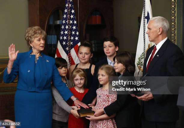 Former wrestling entertainment executive Linda McMahon is surrounded by her grandchildren as U.S. Vice President Mike Pence swears her in as head of...