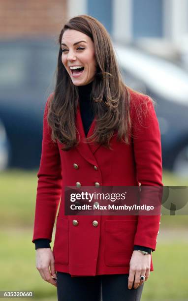 Catherine, Duchess of Cambridge joins in with a team building exercise during a visit to RAF Wittering to meet air cadets taking part in a half-term...