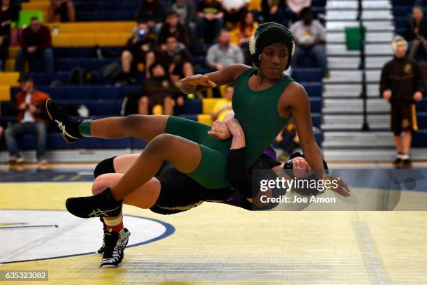 Kaley Barker Mountain View High School 113 pound wrestler takes down Kiyra Dial from George Washington High School during the 4A - Region 2 Wrestling...