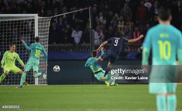 Lionel Messi of Barcelona FC watch Edinson Cavani of Paris Saint-Germain score a goal during the UEFA Champions League Round of 16 first leg match...