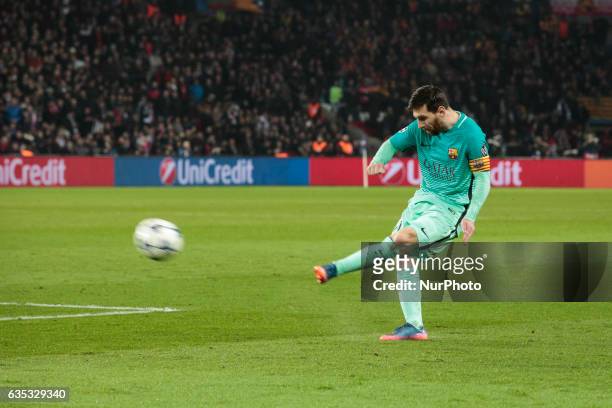 Barcelona Lionel Messi shoots during the UEFA Champions League round of 16 first leg football match between Paris Saint-Germain and FC Barcelona on...