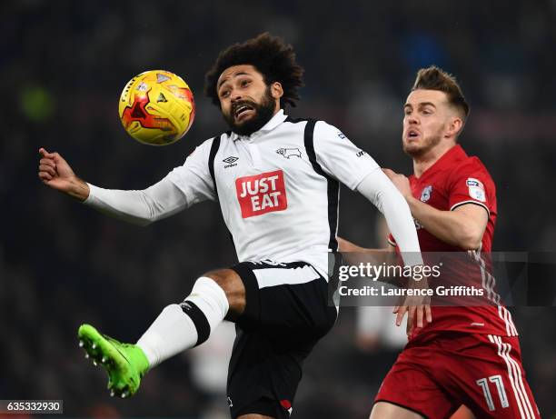 Ikechi Anya of Derby County battles with Craig Noone of Cardiff City during the Sky Bet Championship match between Derby County and Cardiff City at...