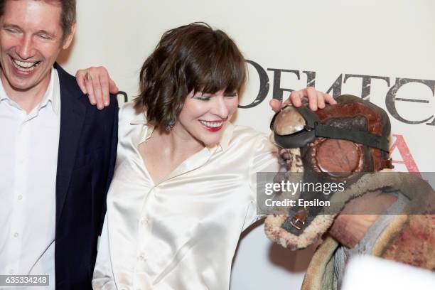 American actress Milla Jovovich and her husband, English film director Paul W. S. Anderson attend at a special screening of their Resident Evil: The...