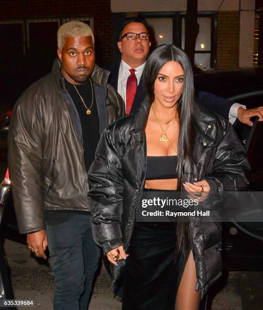 Kim Kardashian and Kanye West arrive at Carbone in Soho on February 14, 2017 in New York City.