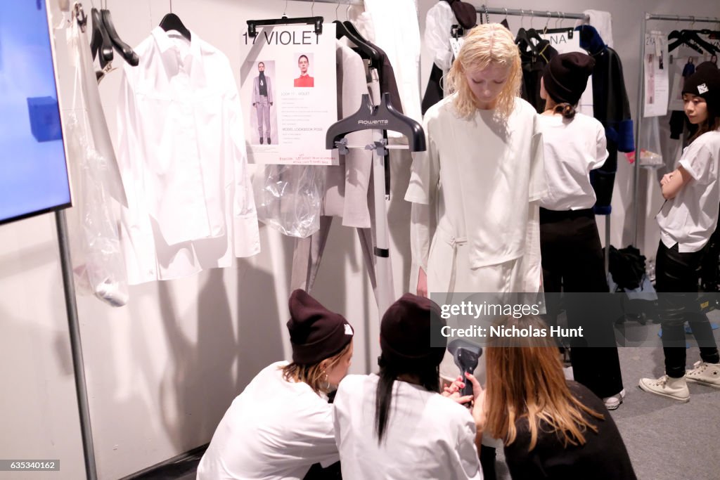A model prepares backstage for the Chiara Boni La Petite Robe... News ...
