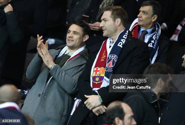 Dan Carter and Ali Williams attend the UEFA Champions League Round of 16 first leg match between Paris Saint-Germain and FC Barcelona at Parc des...