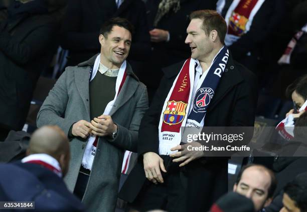 Dan Carter and Ali Williams attend the UEFA Champions League Round of 16 first leg match between Paris Saint-Germain and FC Barcelona at Parc des...