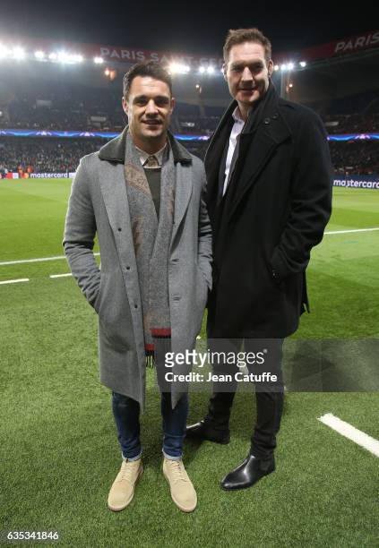 Dan Carter and Ali Williams attend the UEFA Champions League Round of 16 first leg match between Paris Saint-Germain and FC Barcelona at Parc des...