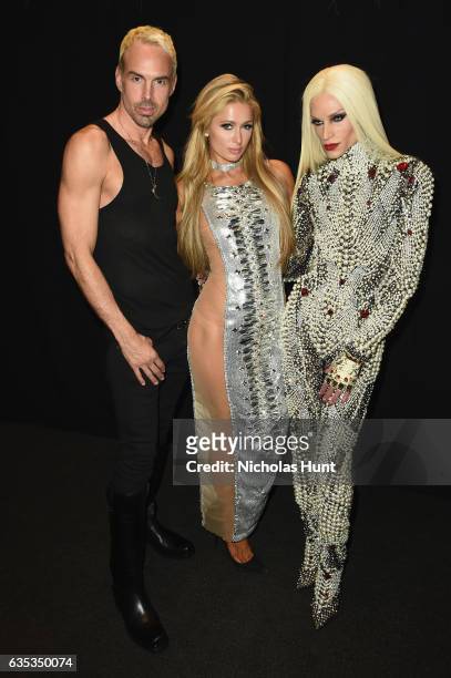 David Blond, Paris Hilton and designer Phillipe Blond pose backstage for the The Blonds collection during, New York Fashion Week: The Shows at...