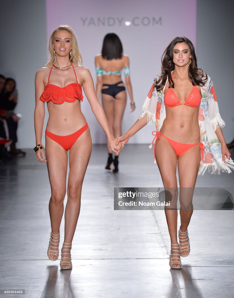 Models walk the runway at the Yandy Swim Show during February 2017