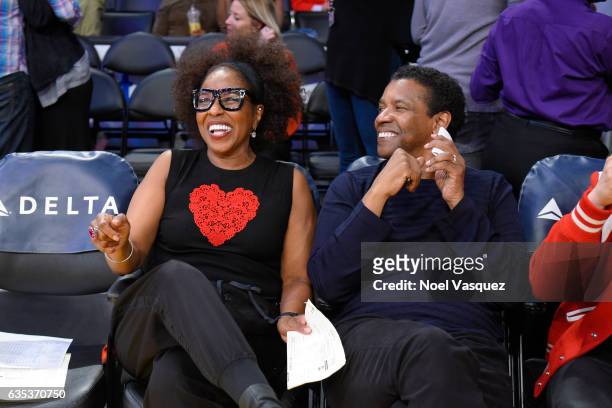 Denzel Washington and Pauletta Washington attends a basketball game between the Sacramento Kings and the Los Angeles Lakers at Staples Center on...