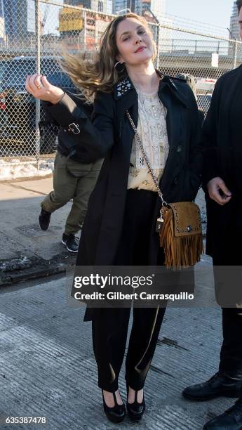 Actress, author, director and producer Drew Barrymore is seen arriving to the Coach FW17 Show during Fashion Week at Pier 76 on February 14, 2017 in...