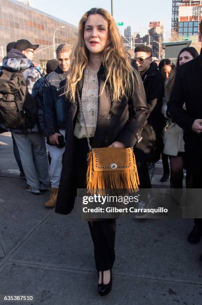 Actress, author, director and producer Drew Barrymore is seen arriving to the Coach FW17 Show during Fashion Week at Pier 76 on February 14, 2017 in...