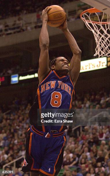 Latrell Sprewell of the New York Knicks goes up for a dunk during their game against the Utah Jazz at the Delta Center in Salt Lake City, Utah....