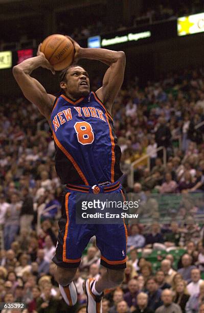 Latrell Sprewell of the New York Knicks goes up for a dunk during their game against the Utah Jazz at the Delta Center in Salt Lake City, Utah....
