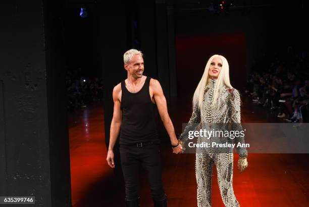 David Blond and Phillipe Blond walk the runway at the The Blonds show during New York Fashion Week: Presented By MADE at Skylight Clarkson Sq on...