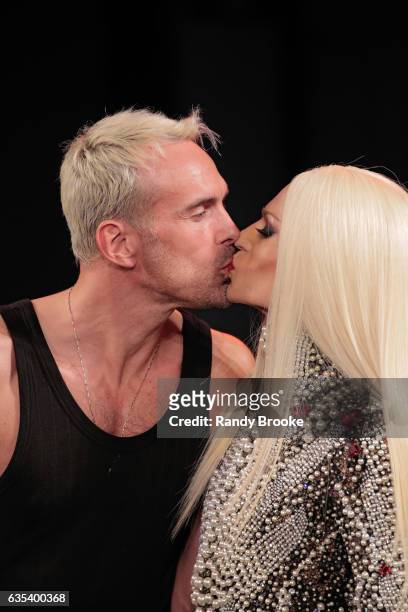 Designers David Blond and Phillipe Blond kiss as they walk the runway during The Blonds February 2017 New York Fashion Week Presented by MADE at...