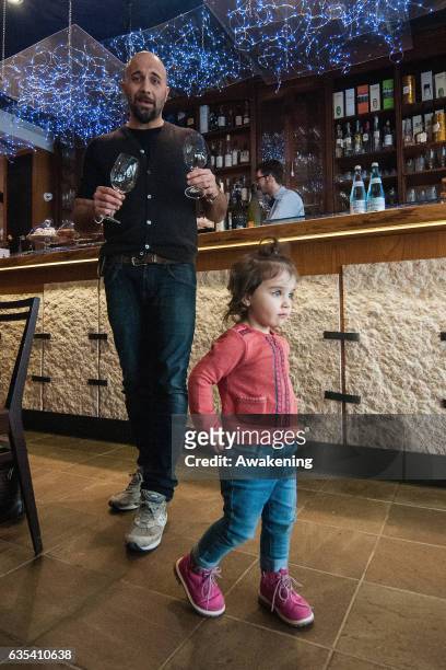 Child walks around in the Antonio Ferrari restaurant on February 15, 2017 in Padova, Italy. The restaurant offers a 5% discount off the total food...
