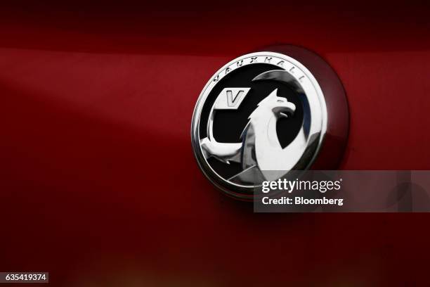 Badge sits on the boot of a Vauxhall Astra for sale at a showroom opposite the Vauxhall plant, operated by General Motors Co., in Luton, U.K., on...