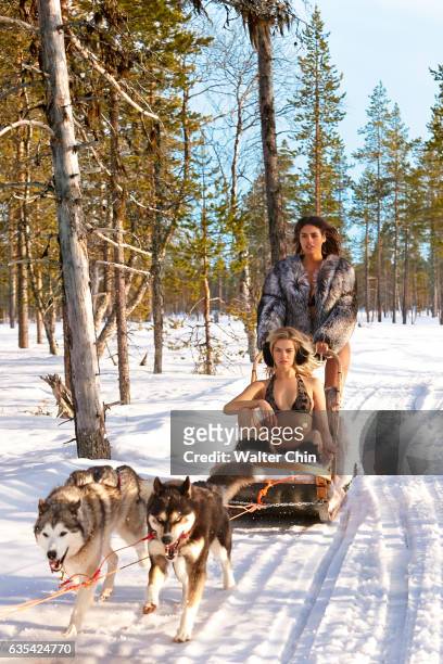 Swimsuit Issue 2017: Models Hailey Clauson and Bo Krsmanovic pose for the 2017 Sports Illustrated swimsuit issue on April 21, 2016 in Lapland,...