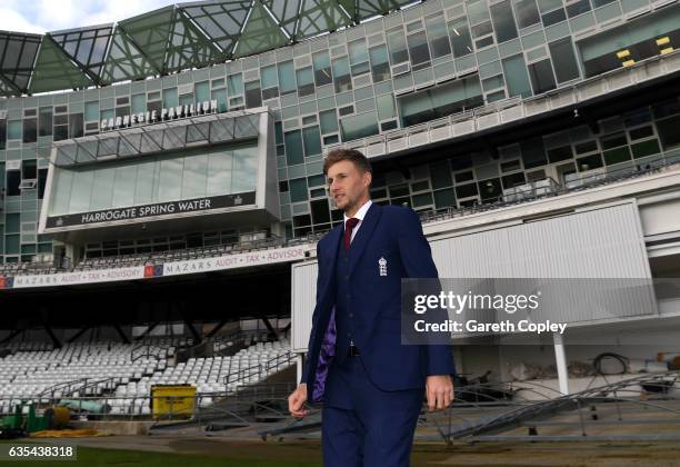 Joe Root of England wlaks out onto the pitch as he poses for photos during a Joe Root Press Conference at Headingley on February 15, 2017 in Leeds,...