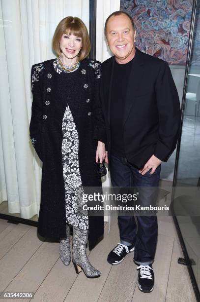 Anna Wintour and designer Michael Kors attend the Michael Kors Collection Fall 2017 runway show at Spring Studios on February 15, 2017 in New York...