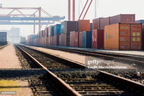 Shipping containers stand in rows in one of the many port facilities on February 15, 2017 in Hamburg, Germany. According to recent statistics German...