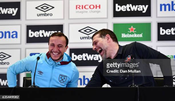 Mark Noble and Slaven Bilic, Manager of West Ham United host a press conference for children during a West Ham United family fun day at London...