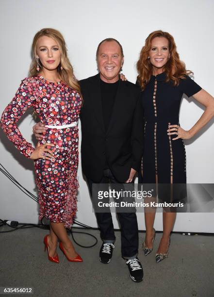 Blake Lively, Michael Kors, and Robyn Lively pose backstage before the Michael Kors Collection Fall 2017 runway show at Spring Studios on February...