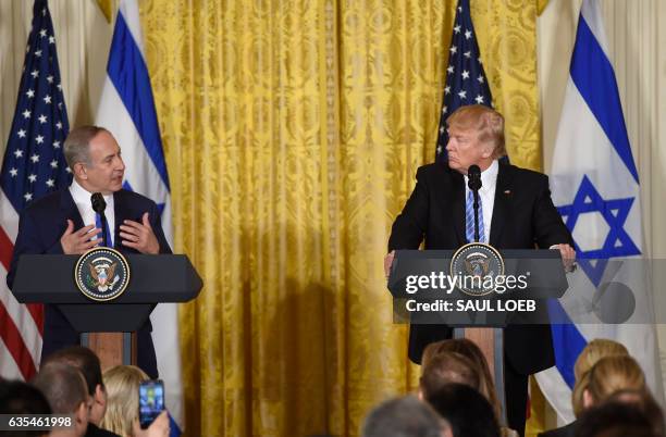 President Donald Trump and Israeli Prime Minister Benjamin Netanyahu hold a joint press conference in the East Room of the White House in Washington,...