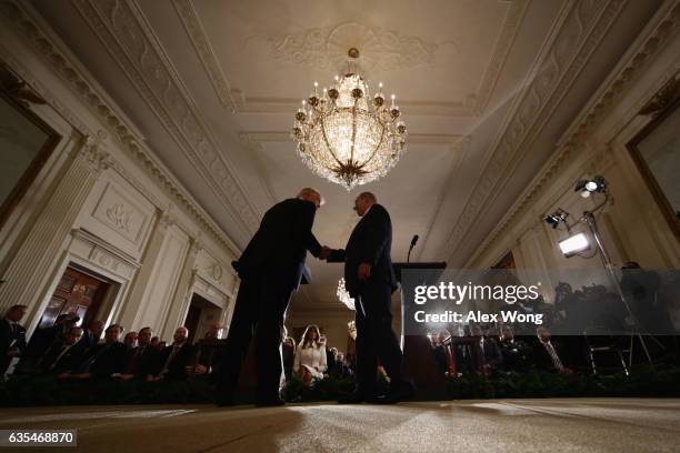 President Donald Trump and Israel Prime Minister Benjamin Netanyahu shake hands during a joint news conference at the East Room of the White House...