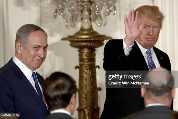 President Donald Trump departs with Israel Prime Minister Benjamin Netanyahu following a joint news conference at the East Room of the White House...