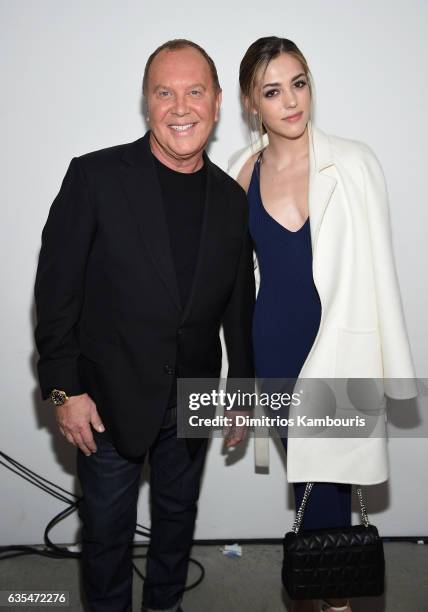 Designer Michael Kors and Sistine Stallone pose backstage before the Michael Kors Collection Fall 2017 runway show at Spring Studios on February 15,...