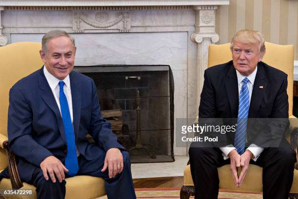 President Donald Trump sits with Israel Prime Minister Benjamin Netanyahu in the Oval Office of the White House on February 15, 2017 in Washington,...