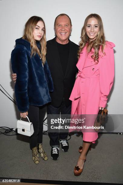 Laura Love, Michael Kors, and Harley Viera-Newton attend the Michael Kors Collection Fall 2017 runway show at Spring Studios on February 15, 2017 in...