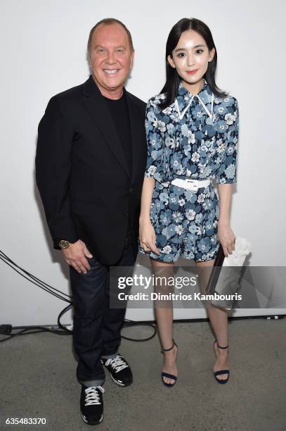 Michael Kors and Gulnazar pose backstage before the Michael Kors Collection Fall 2017 runway show at Spring Studios on February 15, 2017 in New York...