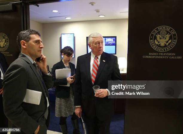 House Minority Whip Steny Hoyer waits to speak to the media at a news conference to introduce bipartisan Russian sanctions legislation in the House...