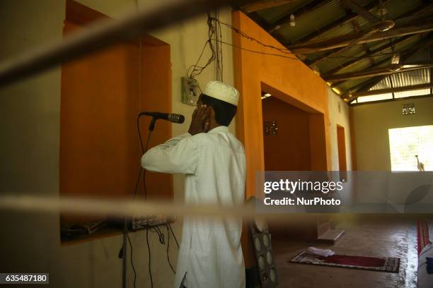 Rohingya man prays inside the madrasah at the makeshift Balu Khali Rohingya refugee camp on February 15, 2017 in Bangladesh. Almost 2000 thousand...