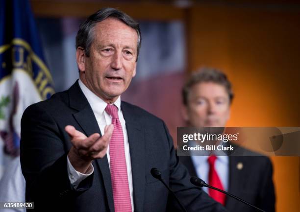 Rep. Mark Sanford, R-S.C., left, and Sen. Rand Paul, R-Ky., along with members of the House Freedom Caucus hold a news conference on Affordable Care...