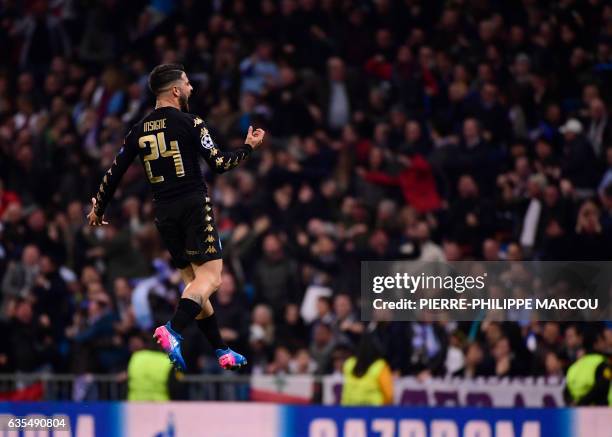 Napoli's midfielder Lorenzo Insigne celebrates a goal during the UEFA Champions League round of 16 first leg football match Real Madrid CF vs SSC...