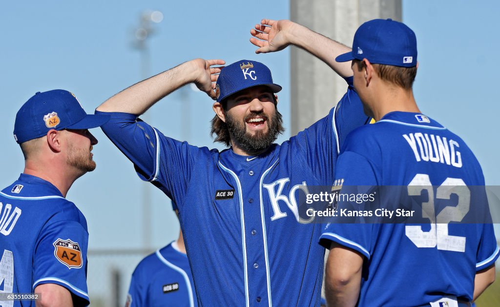 Kansas City Royals pitcher Jason Hammel talks with pitchers Travis ...