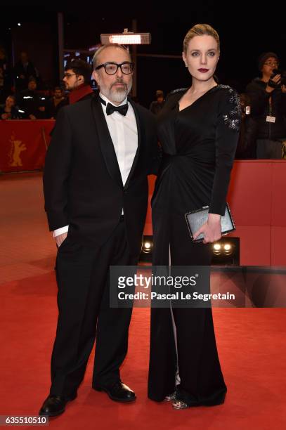 Producer and director Alex de la Iglesia and producer Carolina Bang attend the 'The Bar' premiere during the 67th Berlinale International Film...