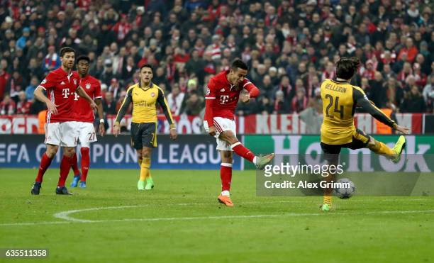 Thiago Alcantara of Muenchen scores the 4th goal during the UEFA Champions League Round of 16 first leg match between FC Bayern Muenchen and Arsenal...