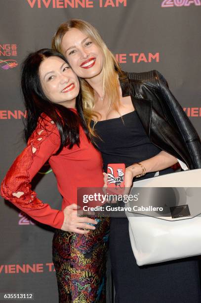 Designer Vivienne Tam and model Petra Nemcova pose backstage at Vivienne Tam FW2017 Runway Show at Gallery 1, Skylight Clarkson Sq during New York...