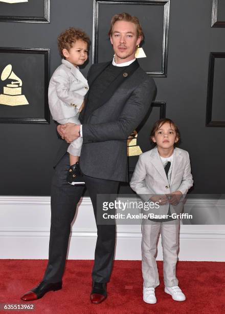 Recording artist Diplo, sons Lazer Pentz and Lockett Pentz attend the 59th GRAMMY Awards at STAPLES Center on February 12, 2017 in Los Angeles,...