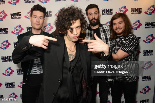 Dan Smith, Matty Healy, Kyle Simmons and Chris Wood pose in the winners room at the VO5 NME Awards 2017 at The O2 Academy Brixton on February 15,...