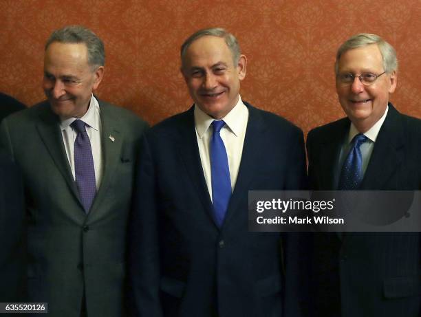 Israeli Prime Minister Benjamin Netanyahu , stands with Senate Majority Leader Mitch McConnell and Senate Minority Leader Chuck Schumer during a...