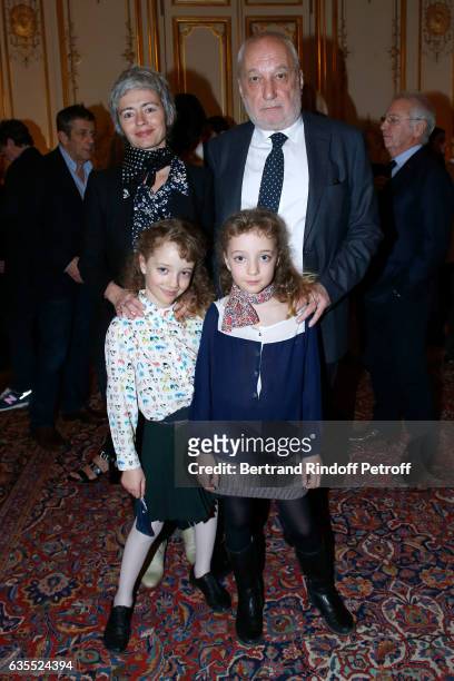 Francois Berleand, his companion Alexia Stresi, their twins daughters Lucie and Adele and Francois's grandson attend Francois Berleand is elevated to...